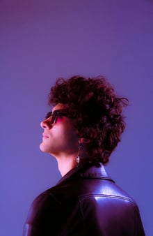 woman in black shirt wearing sunglasses
